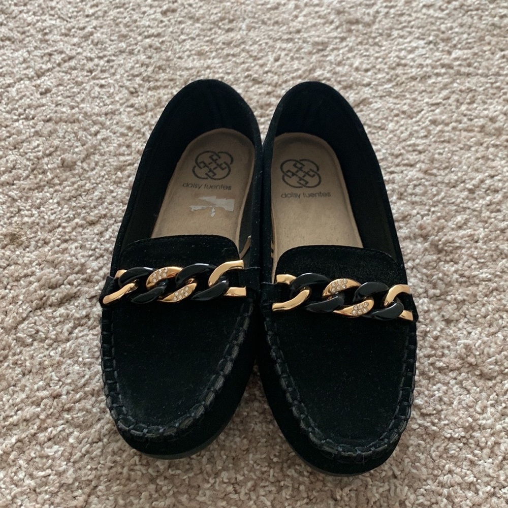 Black and golden loafers